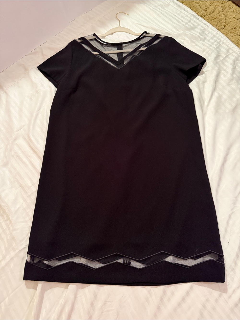 Tahari Arthur S. Levine 
Black Short-Sleeve Mini Dress with Sheer Chevron Insets